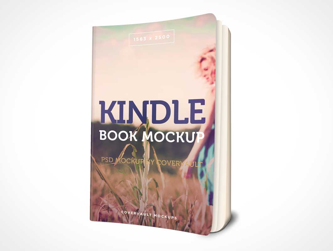 A 3D book mockup design of a book cover with the title "kindle book mockup" against a soft-focus background featuring an outdoor scene with tall grass and a person.