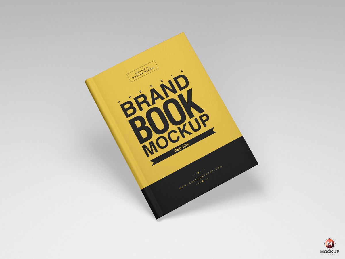 A sleek yellow book cover mockup with "brand book mockup" text, showcasing a professional template for brand book mockup presentations.