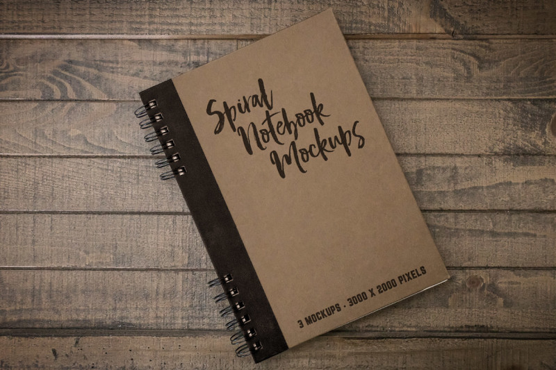 Spiral Notebook on a Wooden Table Mockup