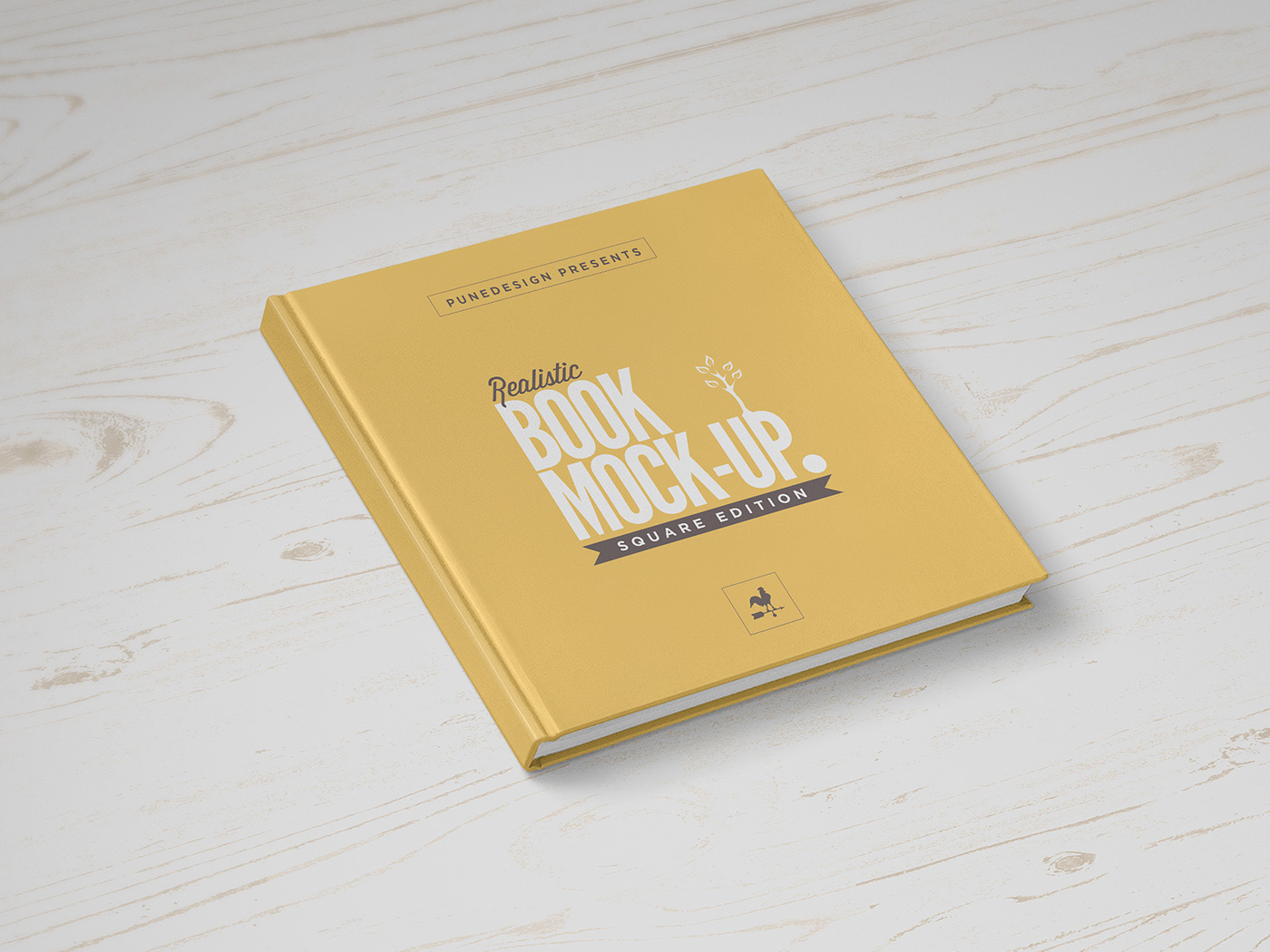 yellow square book mockup laying on desk