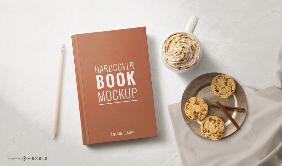 A cozy reading setup with a hardcover book mockup, a cup of creamy topped coffee, and freshly baked cookies on a serene light background.
