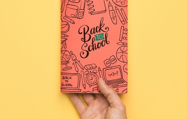 Notebook in Hand Mockup