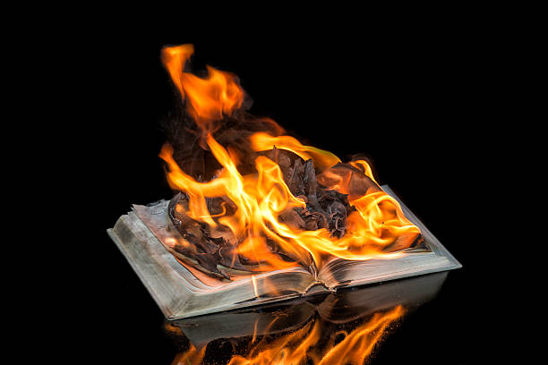 Book on Fire on Black Background 