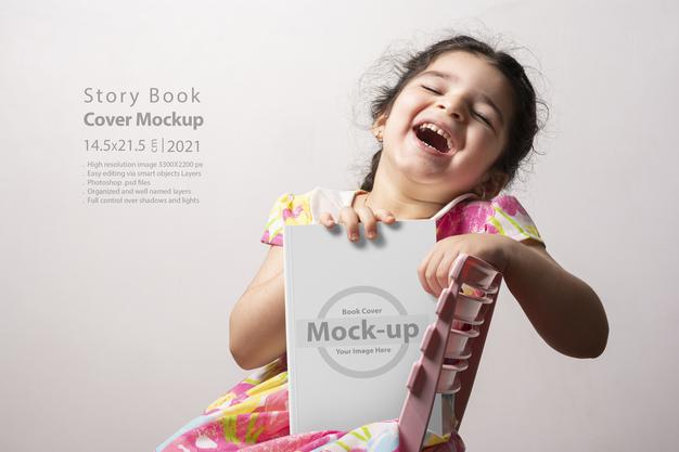 Happy Little Girl Holding Story Book