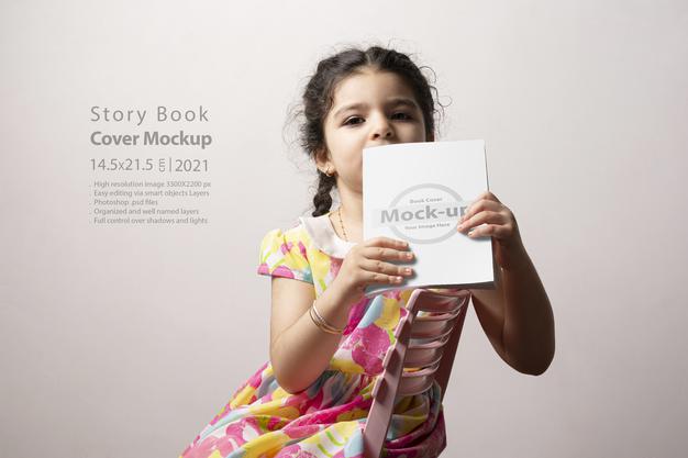 Little Girl Sitting and Holding Story Book