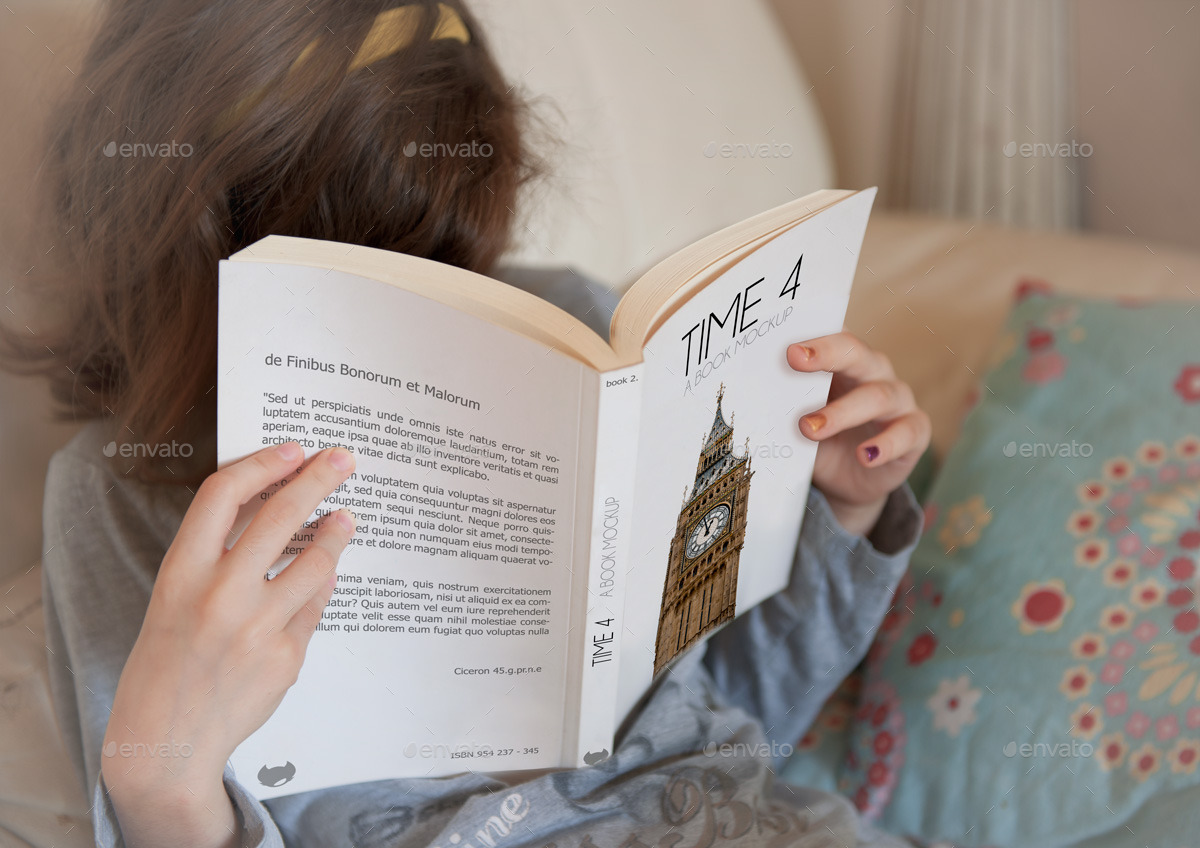 Girl Reading a Book in Bed