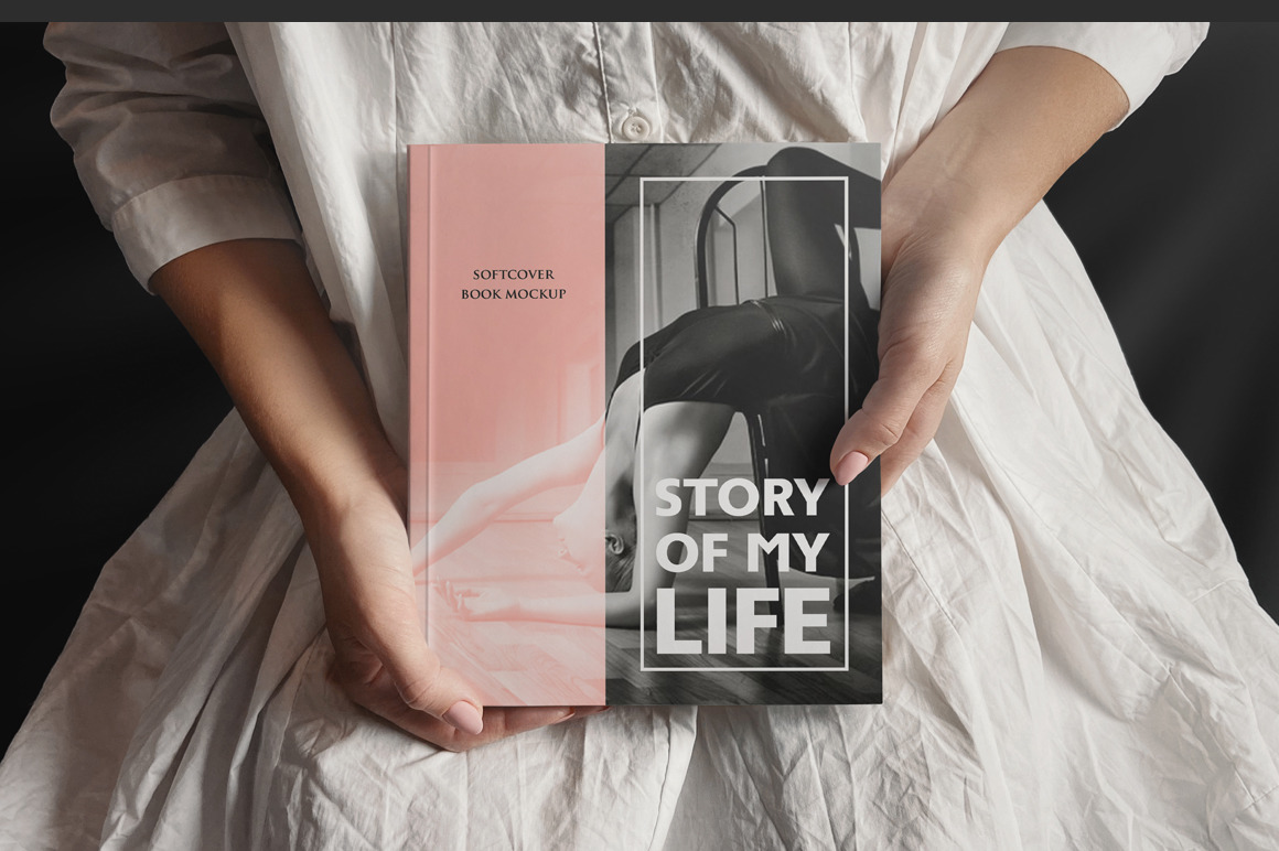 Hands Holding Softcover Book